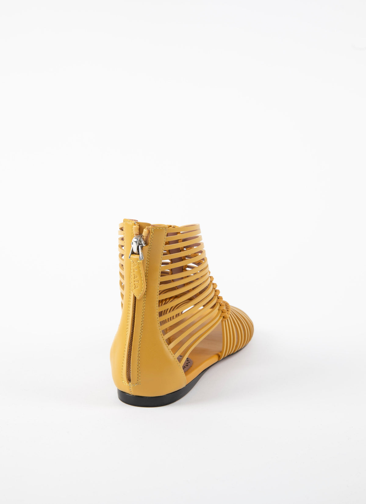 Sandales plates tressées en cuir - Jaune Safran